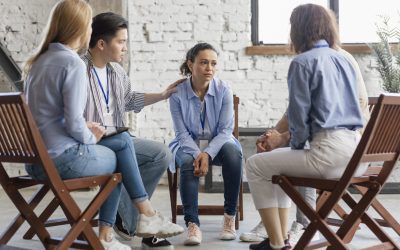 full-shot-people-sitting-chairs OCD Treatment